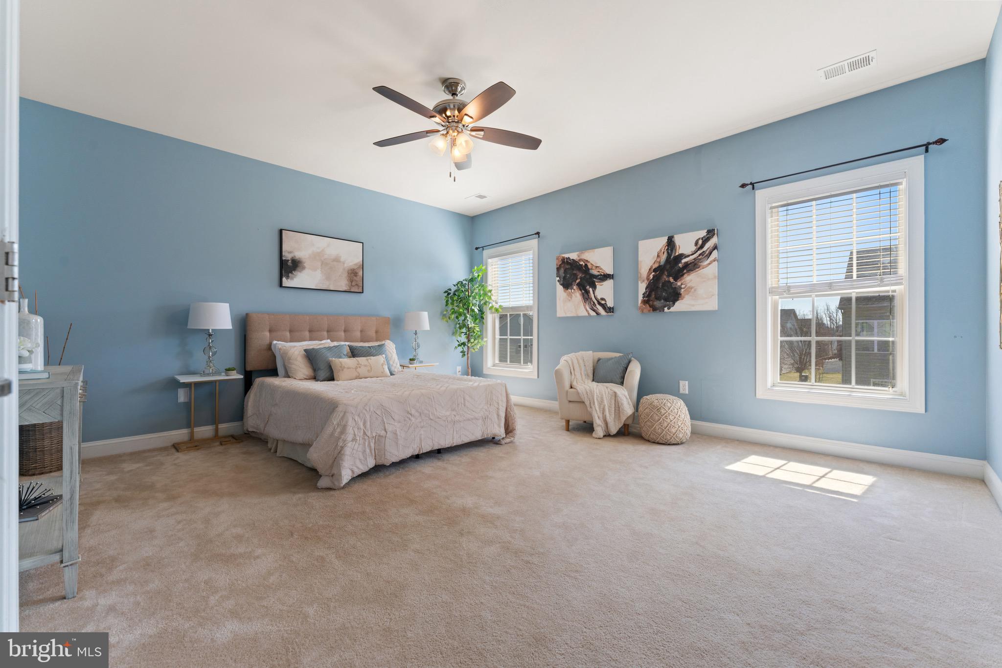 16277 Jetty Loop Woodbridge, VA 22191 - Photo 37 of 92 a bedroom with a bed and a window
