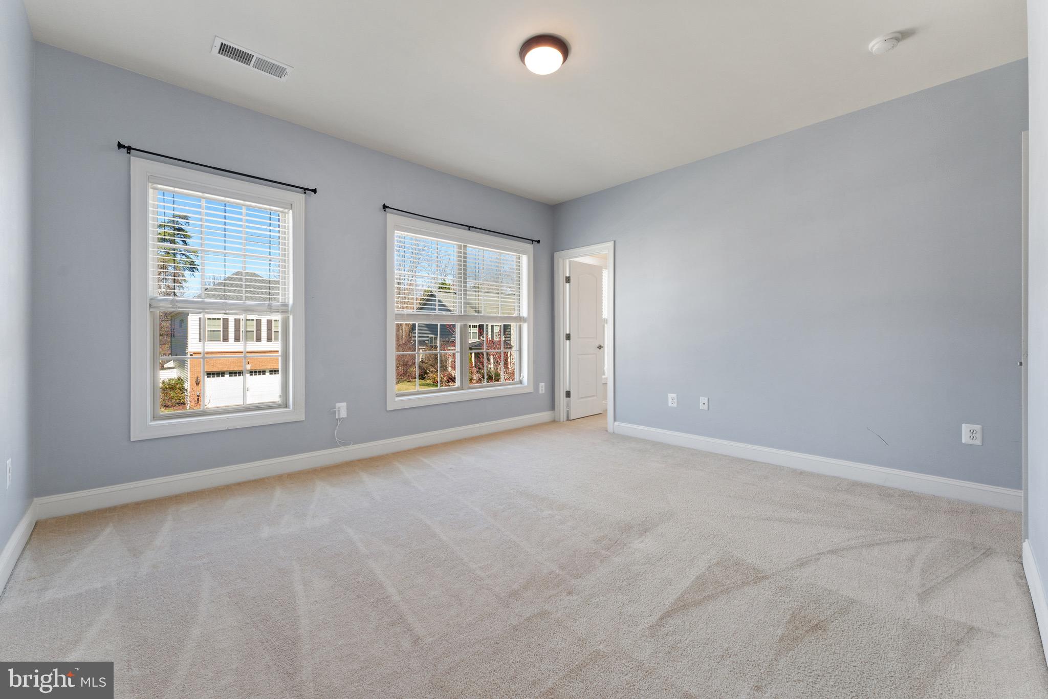 16277 Jetty Loop Woodbridge, VA 22191 - Photo 46 of 92 an empty room with windows and closet