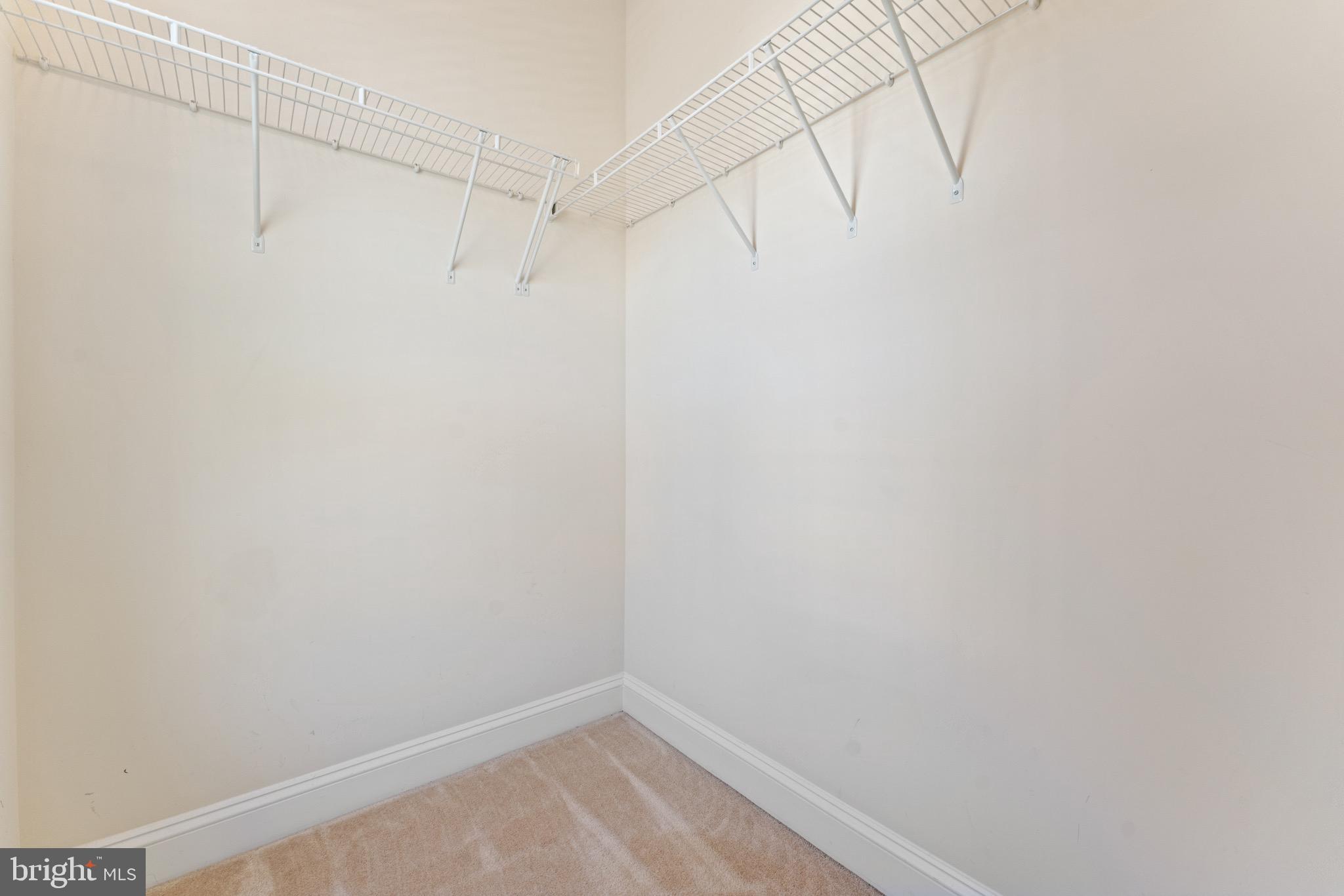 16277 Jetty Loop Woodbridge, VA 22191 - Photo 47 of 92 a view of a room with racks on the wall