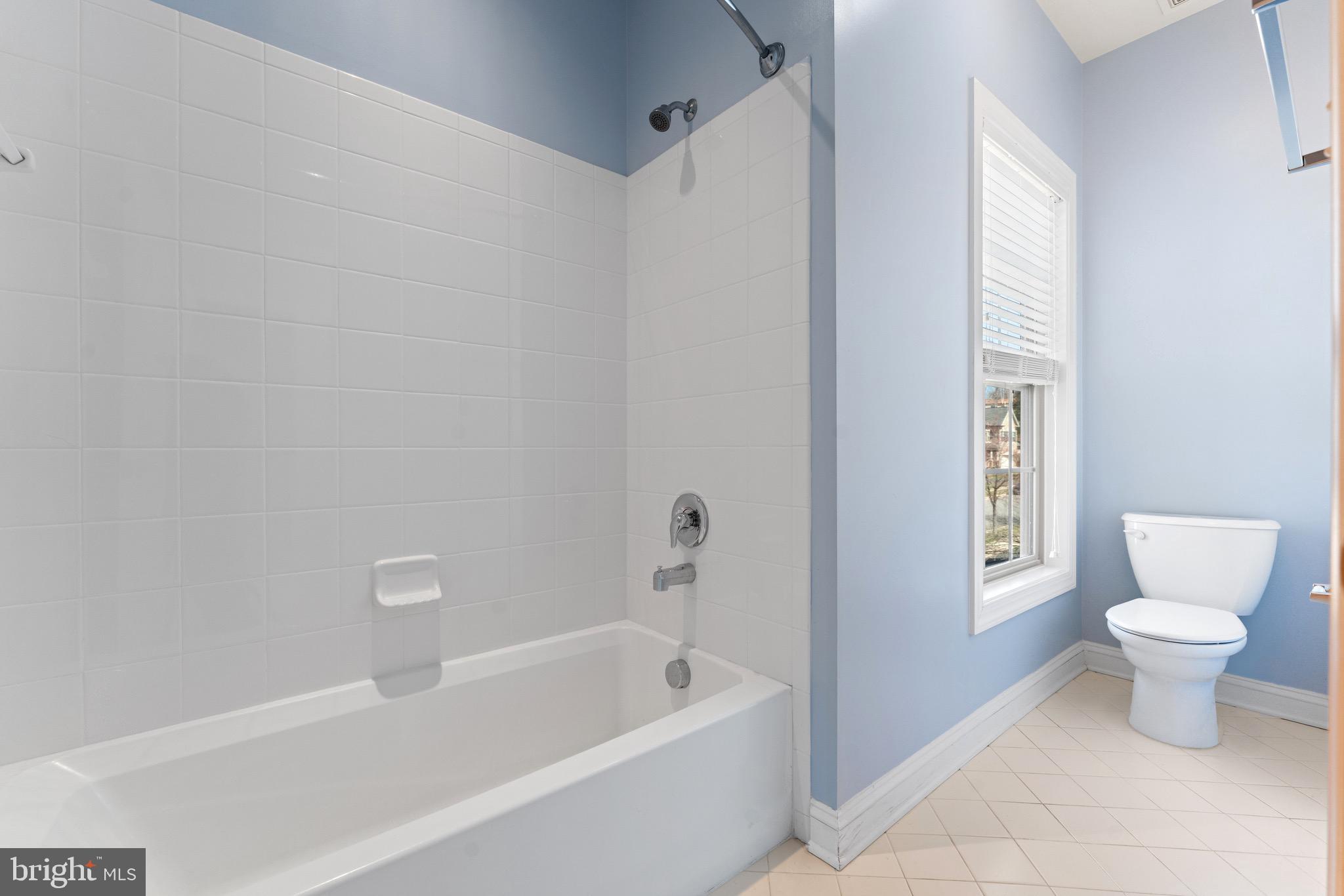 16277 Jetty Loop Woodbridge, VA 22191 - Photo 49 of 92 a bathroom with a toilet and a bathtub