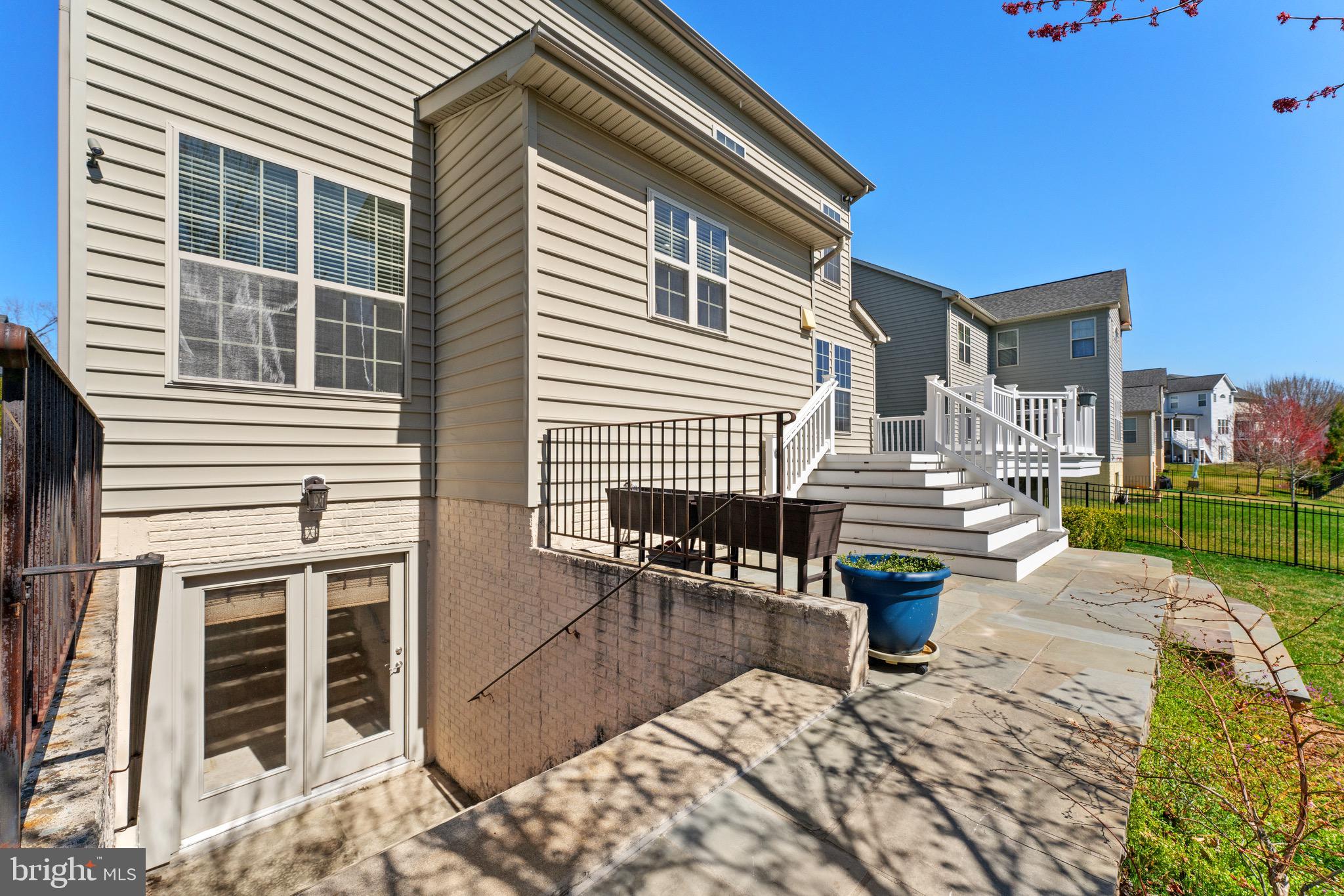 16277 Jetty Loop Woodbridge, VA 22191 - Photo 81 of 92 a front view of a house with patio