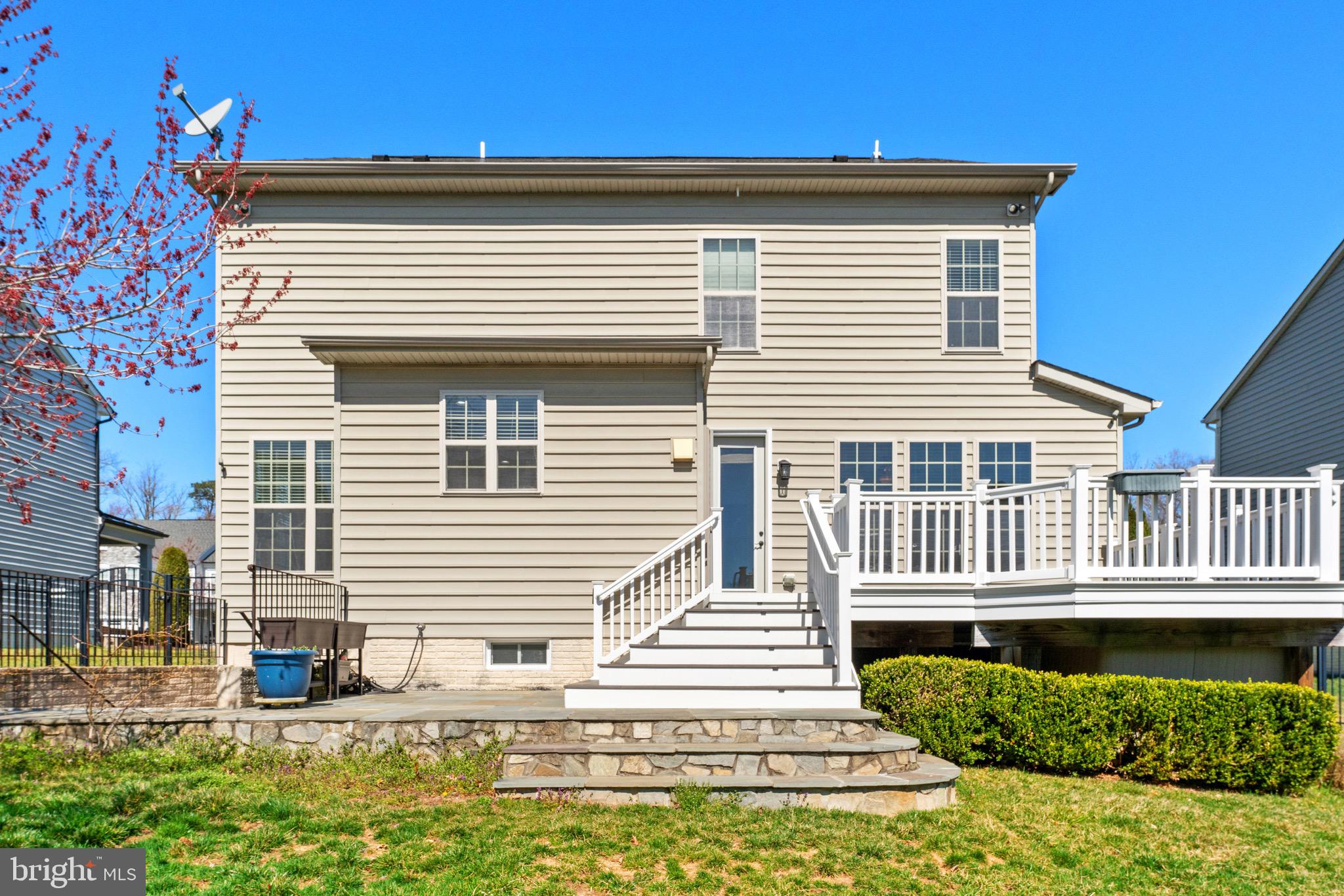 16277 Jetty Loop Woodbridge, VA 22191 - Photo 82 of 92 a front view of a house with a yard