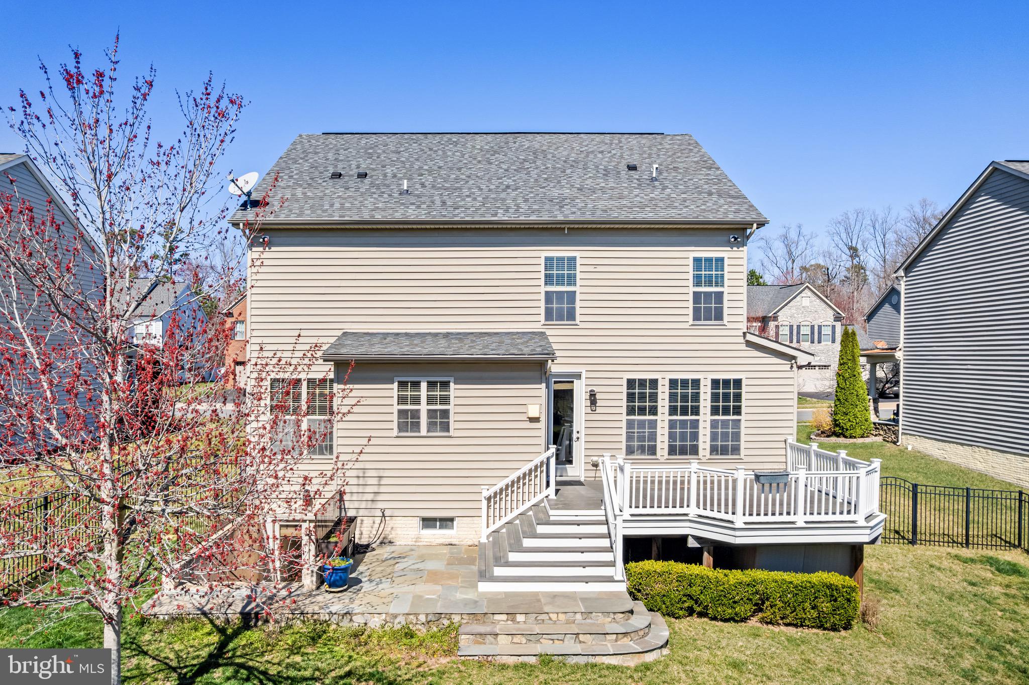 16277 Jetty Loop Woodbridge, VA 22191 - Photo 86 of 92 a view of a house with a yard