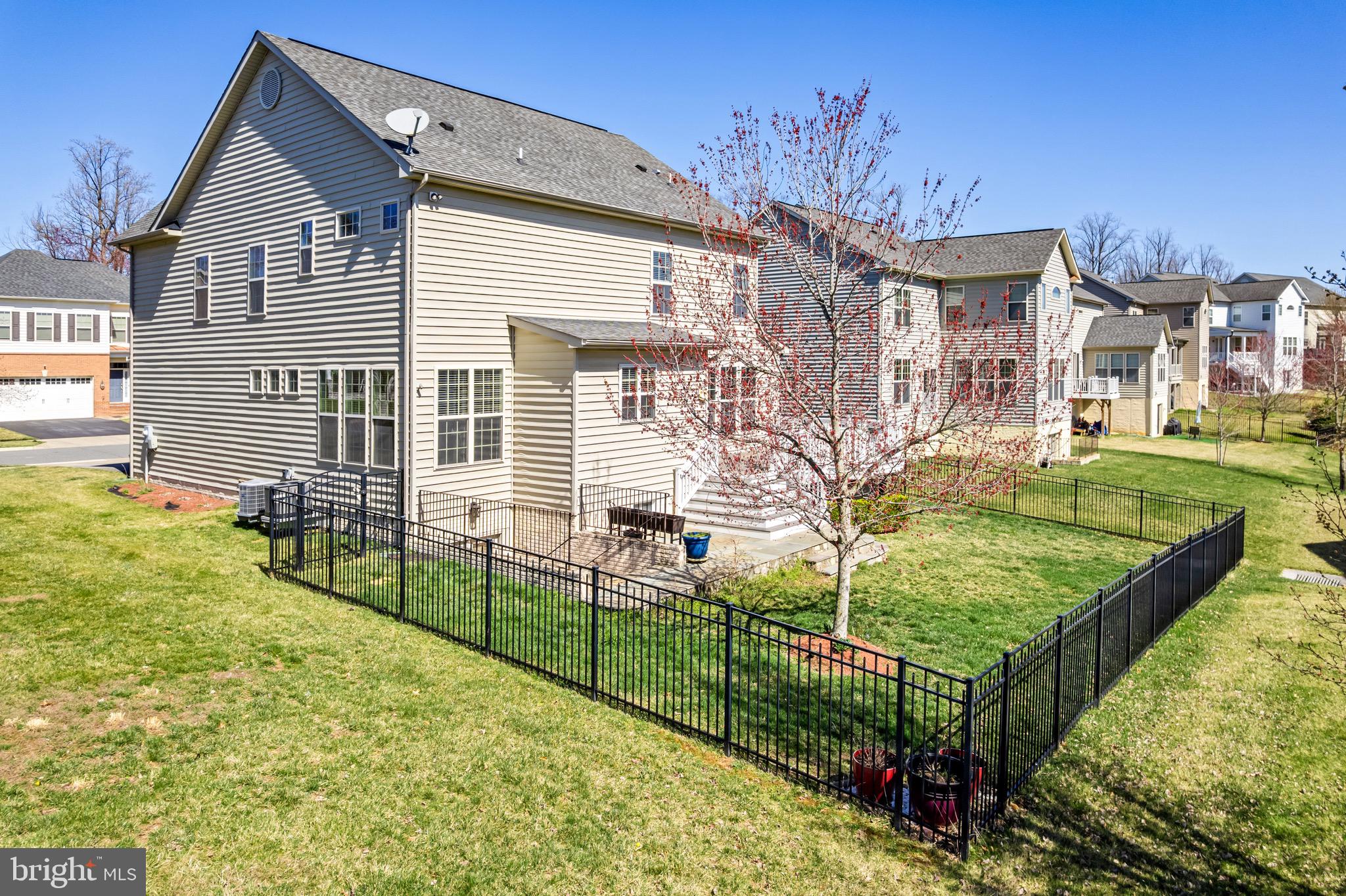 16277 Jetty Loop Woodbridge, VA 22191 - Photo 89 of 92 front view of a house with a yard