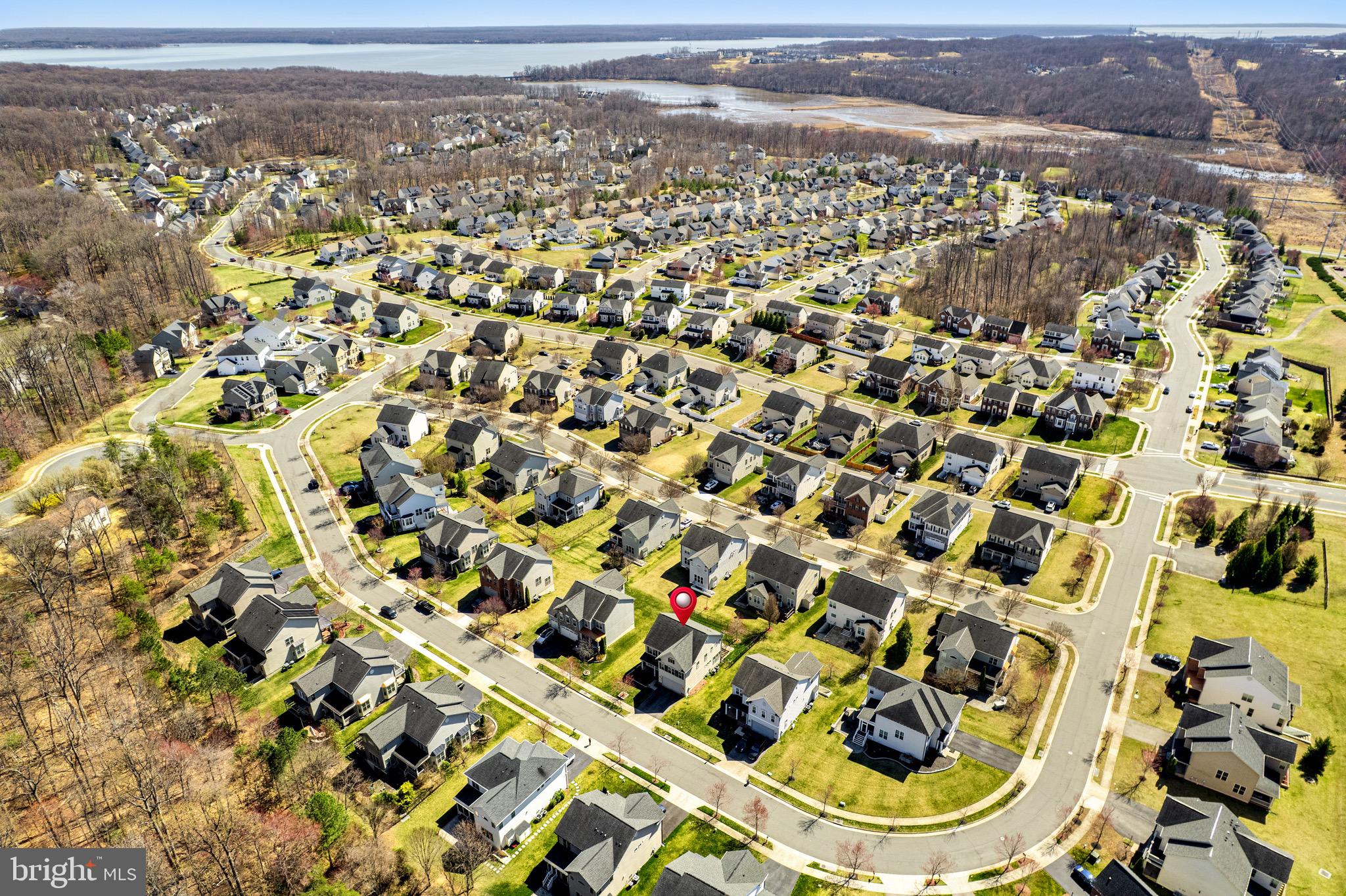 16277 Jetty Loop Woodbridge, VA 22191 - Photo 91 of 92 an aerial view of residential building with parking space