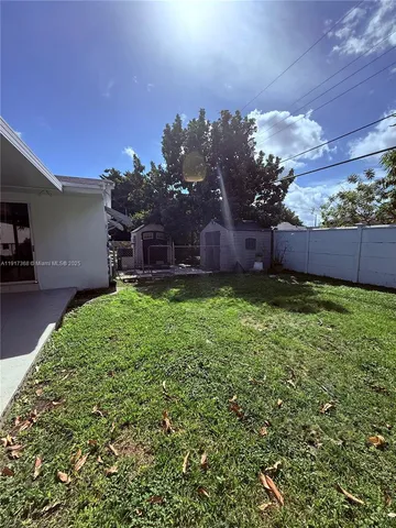 a house view with a garden space