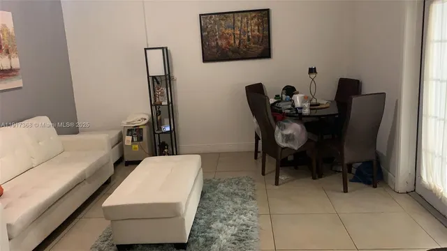 a workspace with furniture and a window