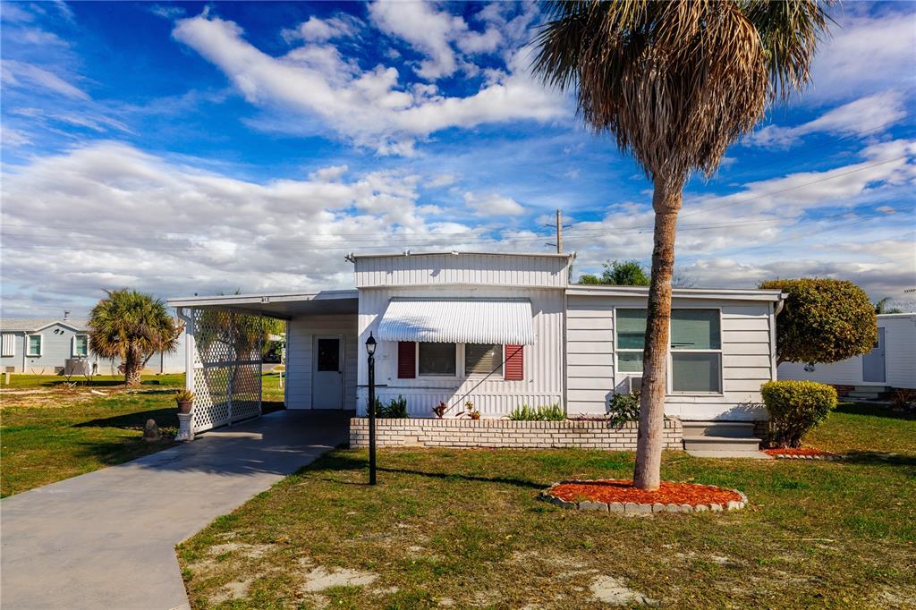 412 Osprey Drive Sebastian, FL 32976 - Photo 1 of 35 a view of a house with swimming pool and sitting area