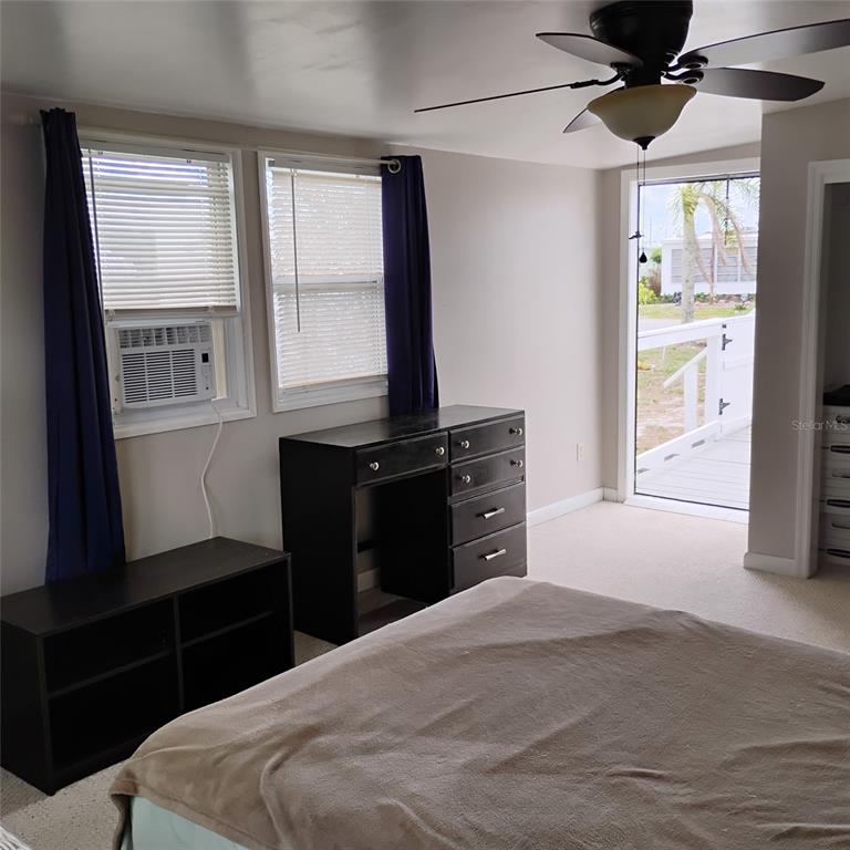 412 Osprey Drive Sebastian, FL 32976 - Photo 20 of 35 a bedroom with a bed and a window