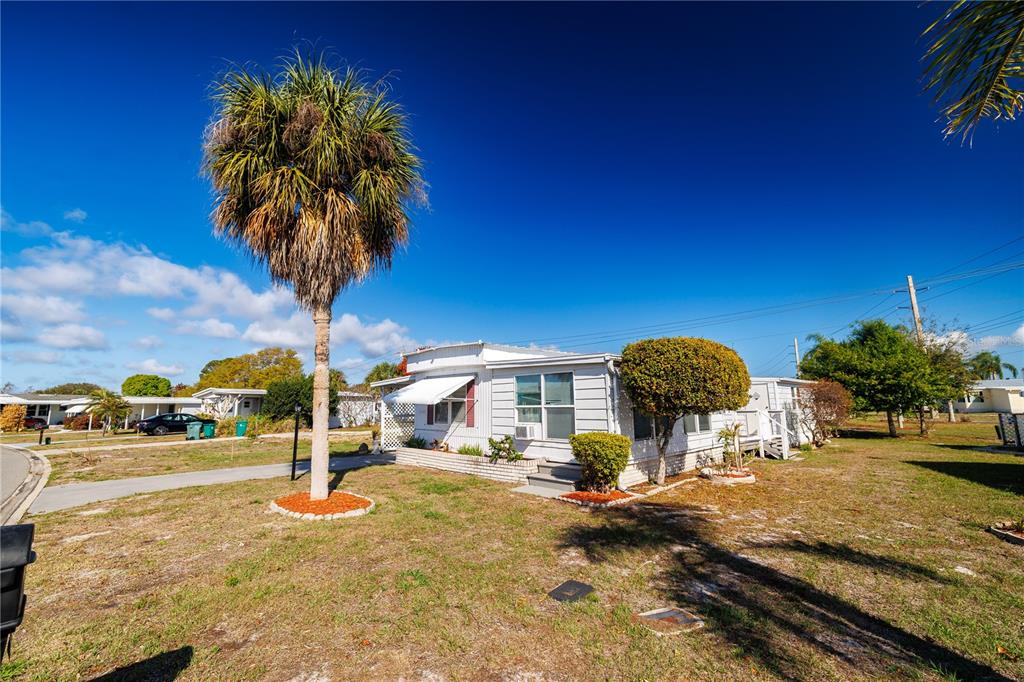 412 Osprey Drive Sebastian, FL 32976 - Photo 2 of 35 a front view of a house with garden