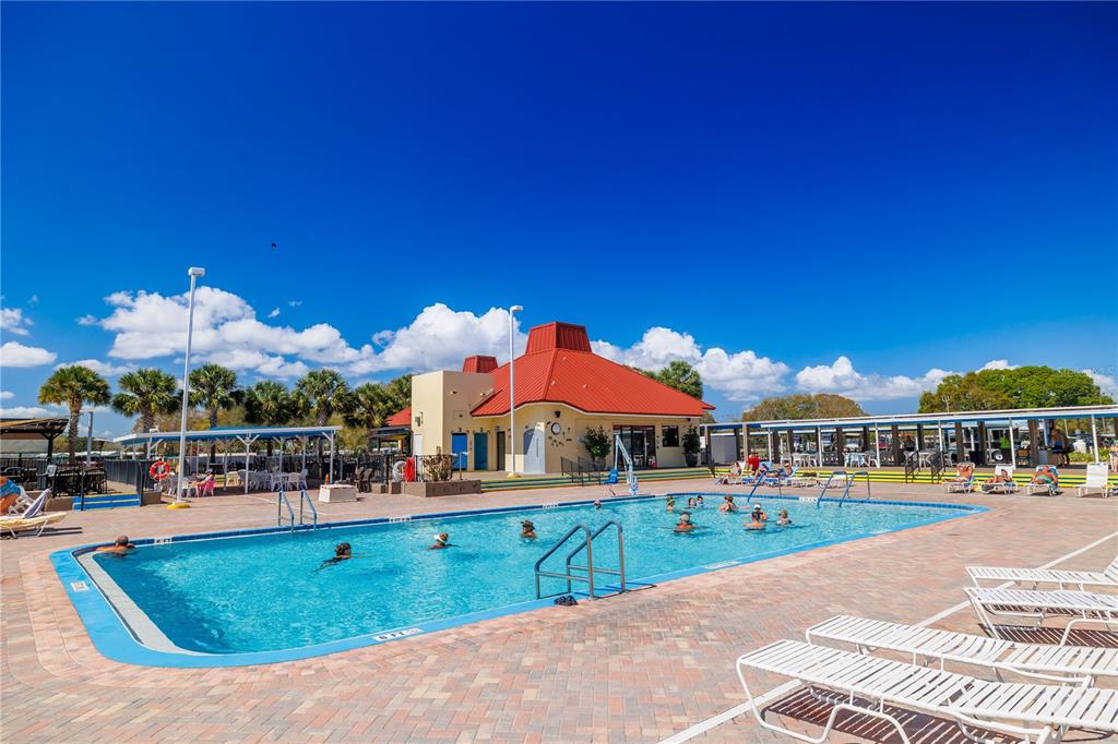 412 Osprey Drive Sebastian, FL 32976 - Photo 29 of 35 a view of swimming pool with outdoor seating and city view