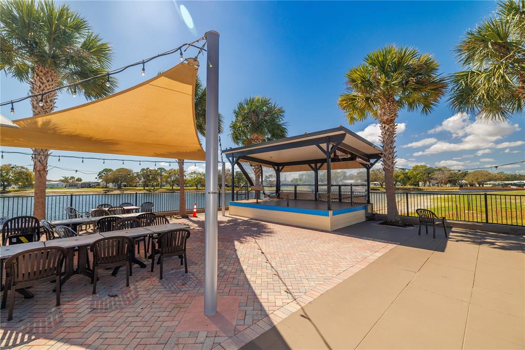 412 Osprey Drive Sebastian, FL 32976 - Photo 30 of 35 a view of a patio with swimming pool and sitting area