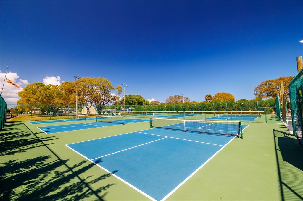 412 Osprey Drive Sebastian, FL 32976 - Photo 35 of 35 a view of an outdoor space and tennis court