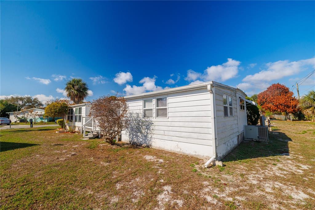 412 Osprey Drive Sebastian, FL 32976 - Photo 6 of 35 a view of a house with a yard