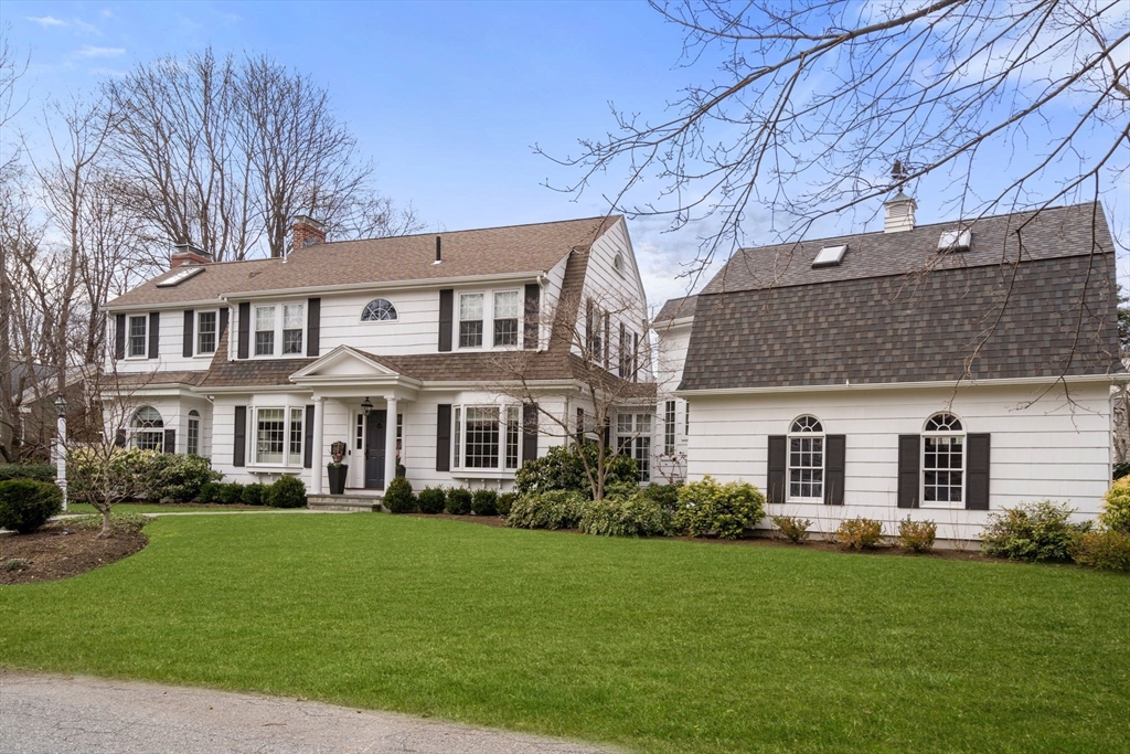 11 Mossfield Road Newton, MA 02468 - Photo 1 of 32 a front view of a house with a yard and trees