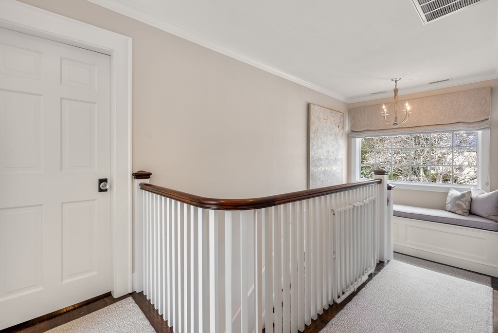 11 Mossfield Road Newton, MA 02468 - Photo 17 of 32 a view of a hallway with windows