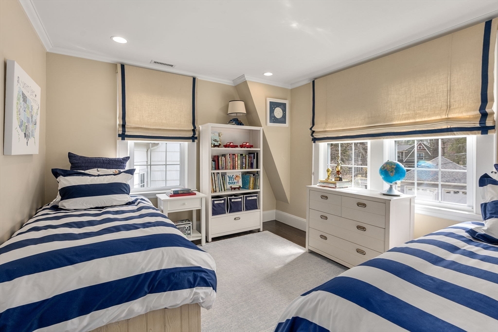 11 Mossfield Road Newton, MA 02468 - Photo 23 of 32 a bedroom with furniture and a window