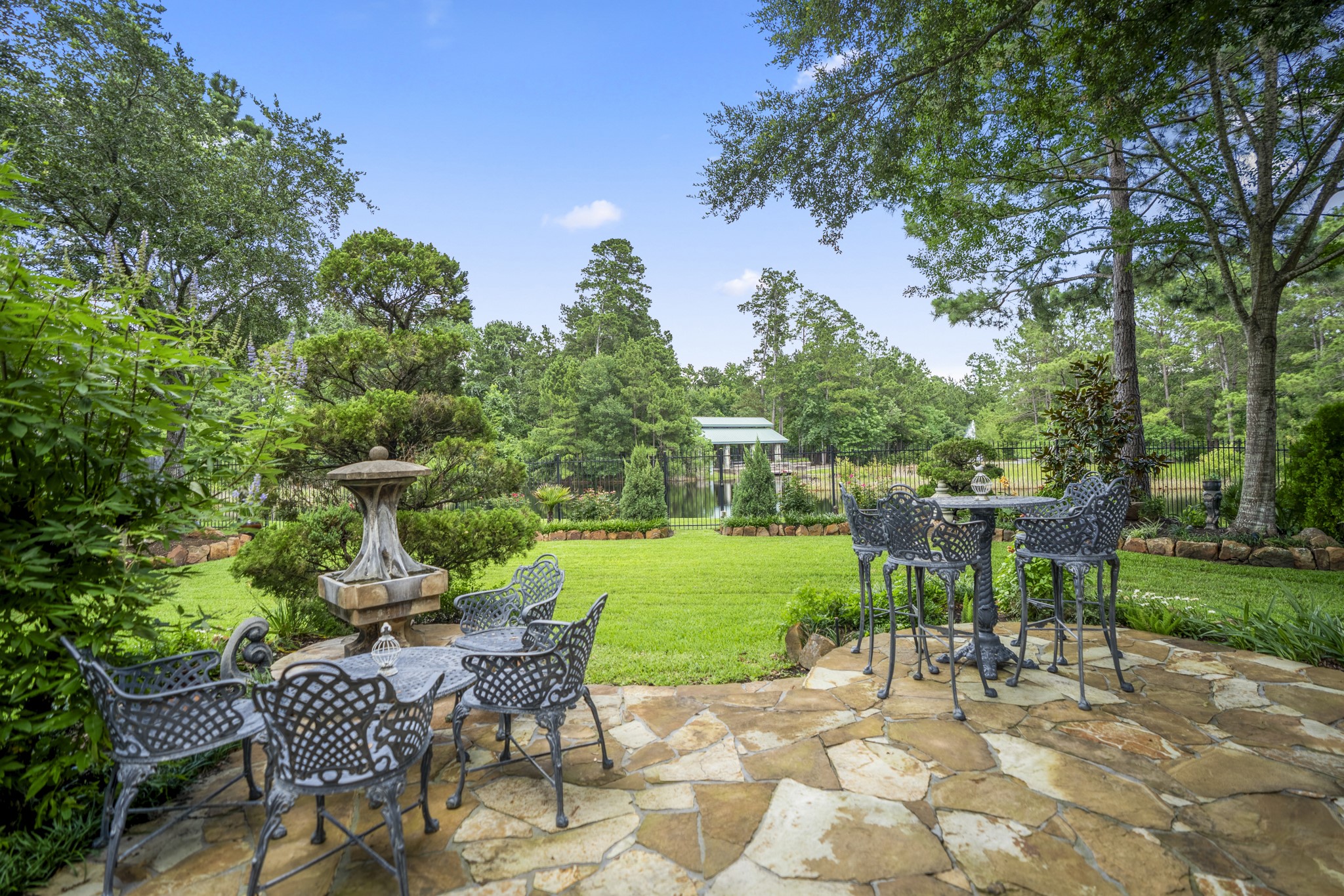 67 North Pentenwell Circle Spring, TX 77382 - Photo 39 of 50 a view of a chair and table in backyard of the house