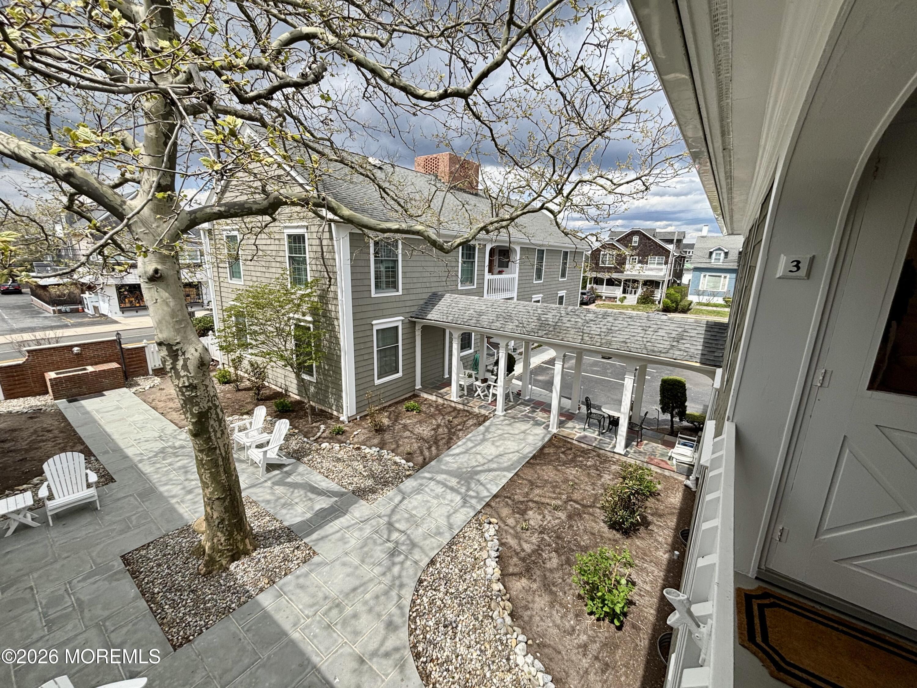 21 Mount Street, Unit B3 Bay Head, NJ 08742 - Photo 13 of 17 a front view of a house with a yard