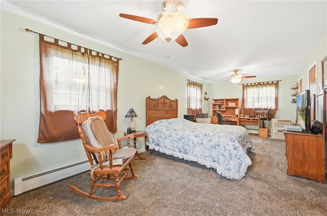 3898 New Road Austintown, OH 44515 - Photo 22 of 45 Expansive primary- comfortably fit your King bed & ample space for sitting are, desk/office space, or nursery