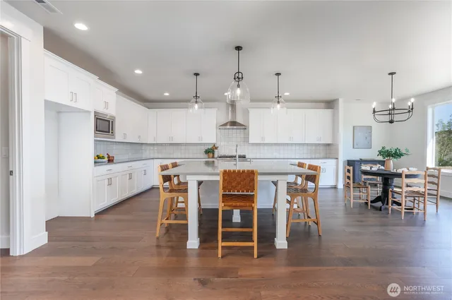 a view of kitchen with breakfast area