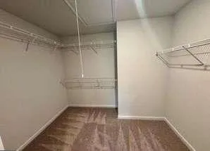 a view of a room with racks on the wall