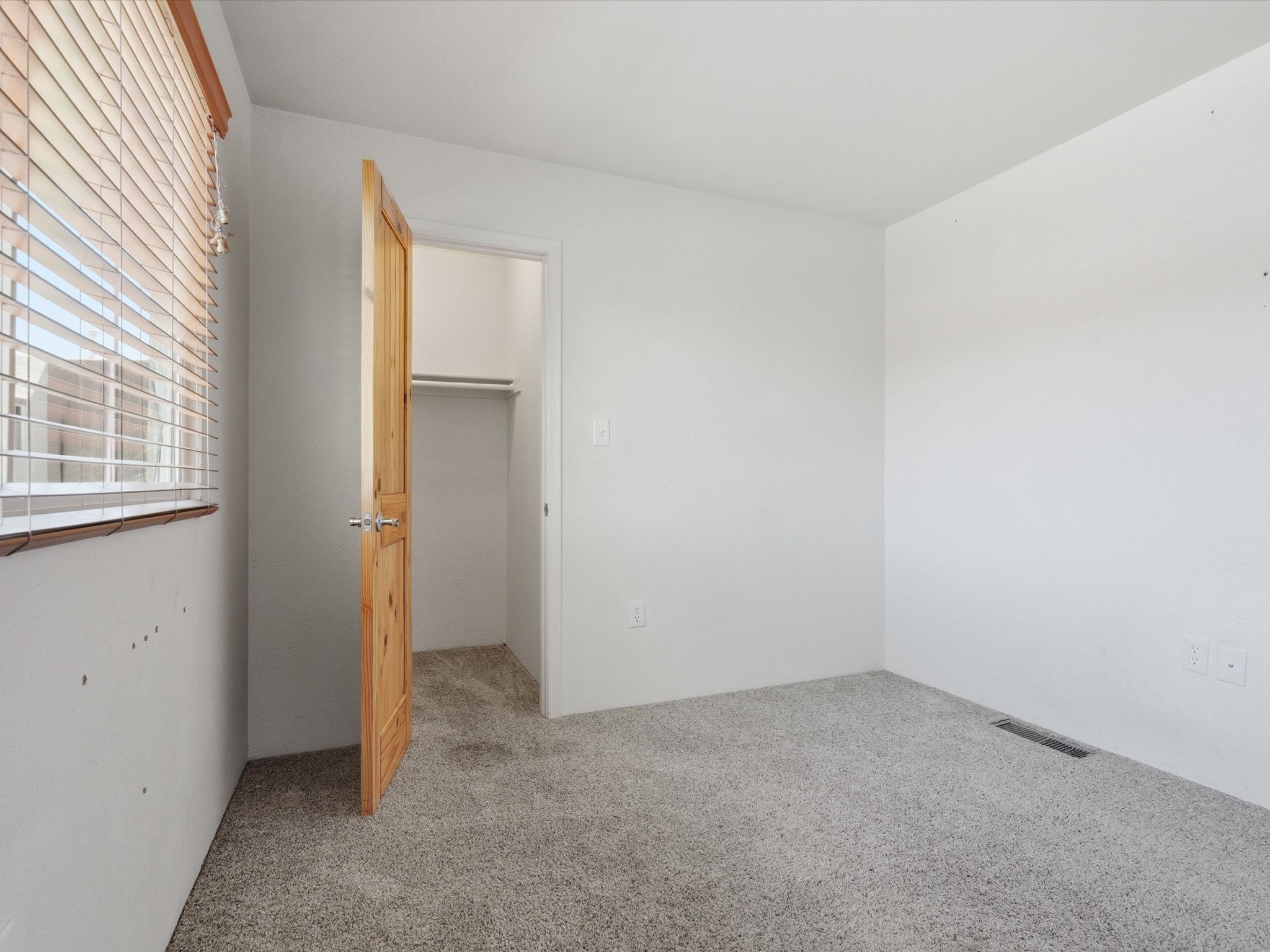 2210 Miguel Chavez Road, Unit 411 Santa Fe, NM 87505 - Photo 28 of 59 Second bedroom with walk in closet
