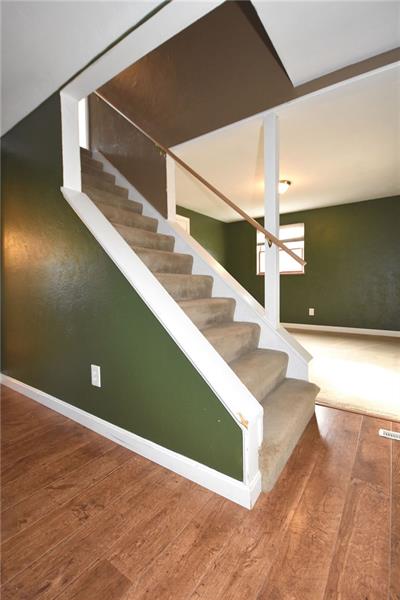 114 Howell Street Elizabeth, PA 15037 - Photo 2 of 20 Stairwell to Second Floor, Dining Room in Background