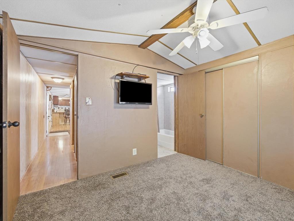 196 Perch Road Bowie, TX 76230 - Photo 19 of 33 a view of a livingroom with wooden floor