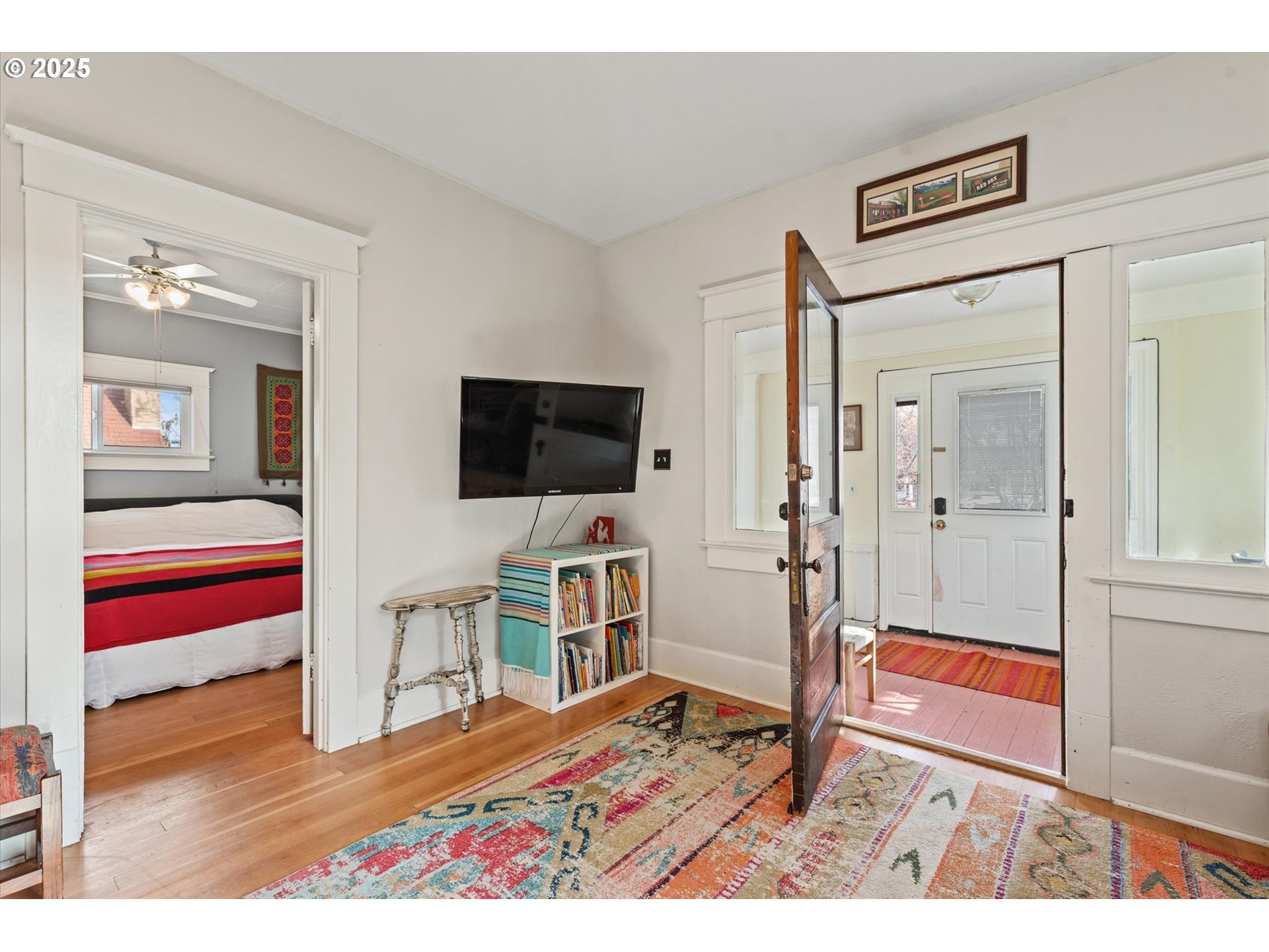 2819 College Street Baker City, OR 97814 - Photo 14 of 47 a living room with furniture and a flat screen tv