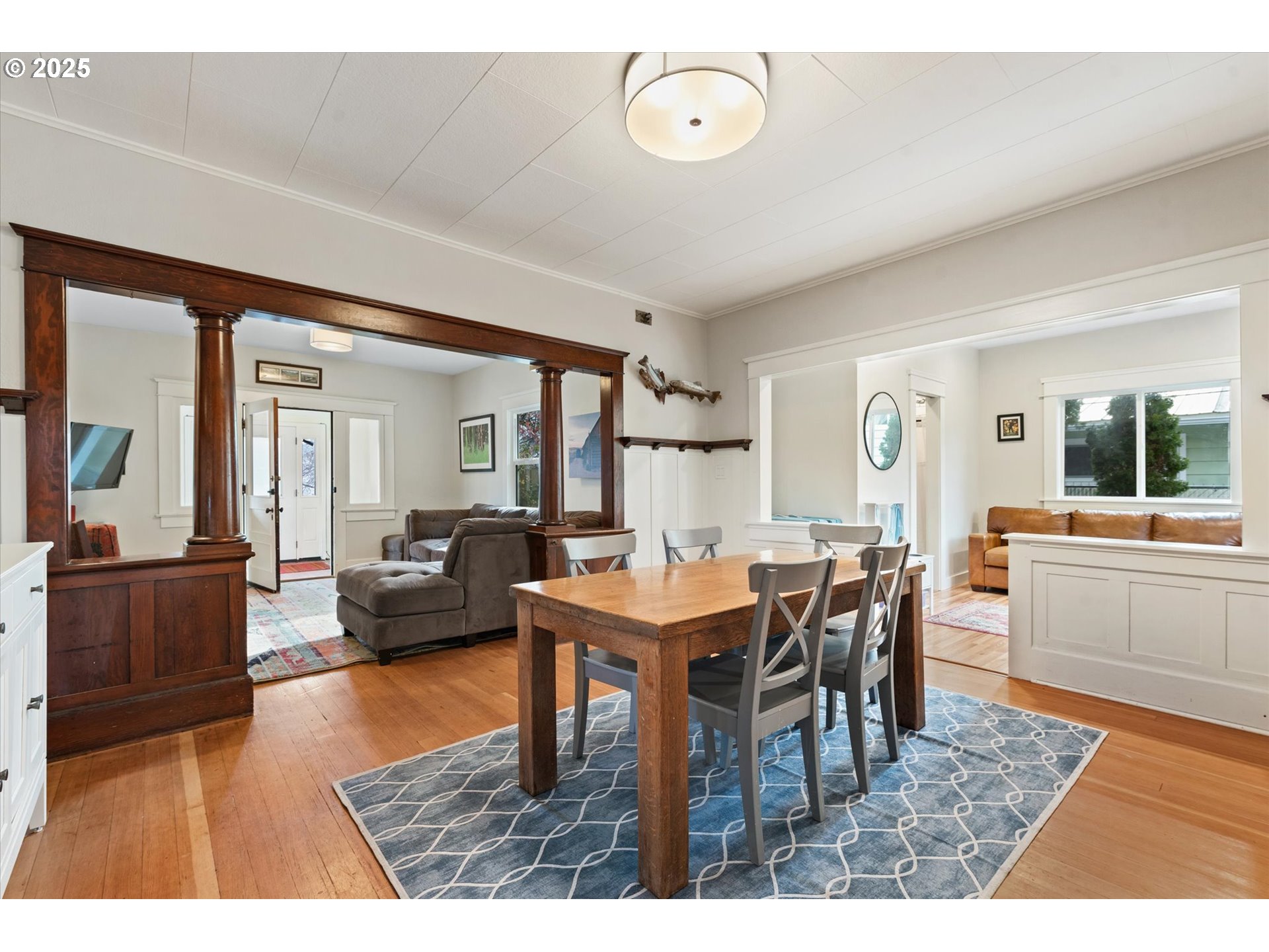 2819 College Street Baker City, OR 97814 - Photo 21 of 47 a view of a dining room with furniture and wooden floor