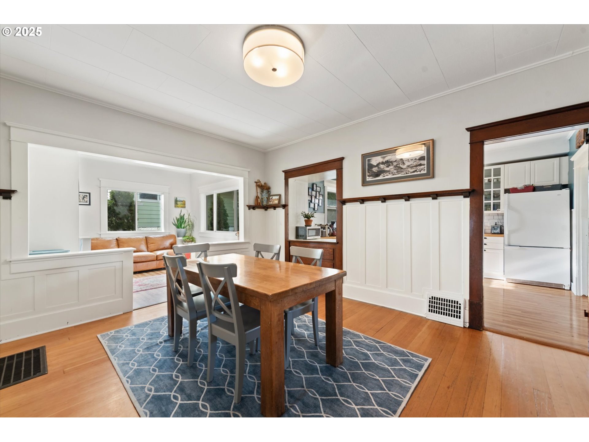 2819 College Street Baker City, OR 97814 - Photo 23 of 47 a view of a dining room with furniture and wooden floor