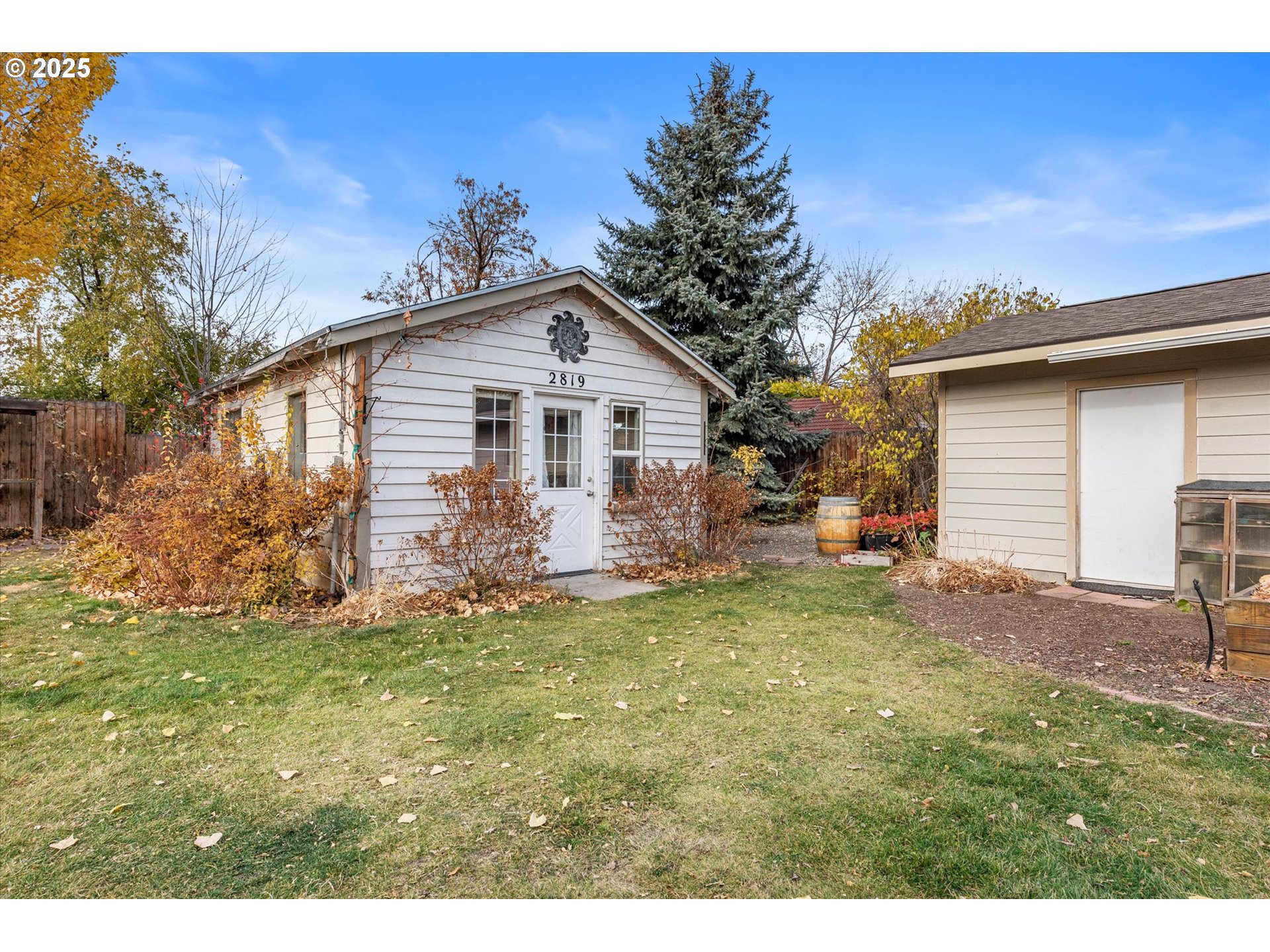 2819 College Street Baker City, OR 97814 - Photo 33 of 47 a view of a house with a yard