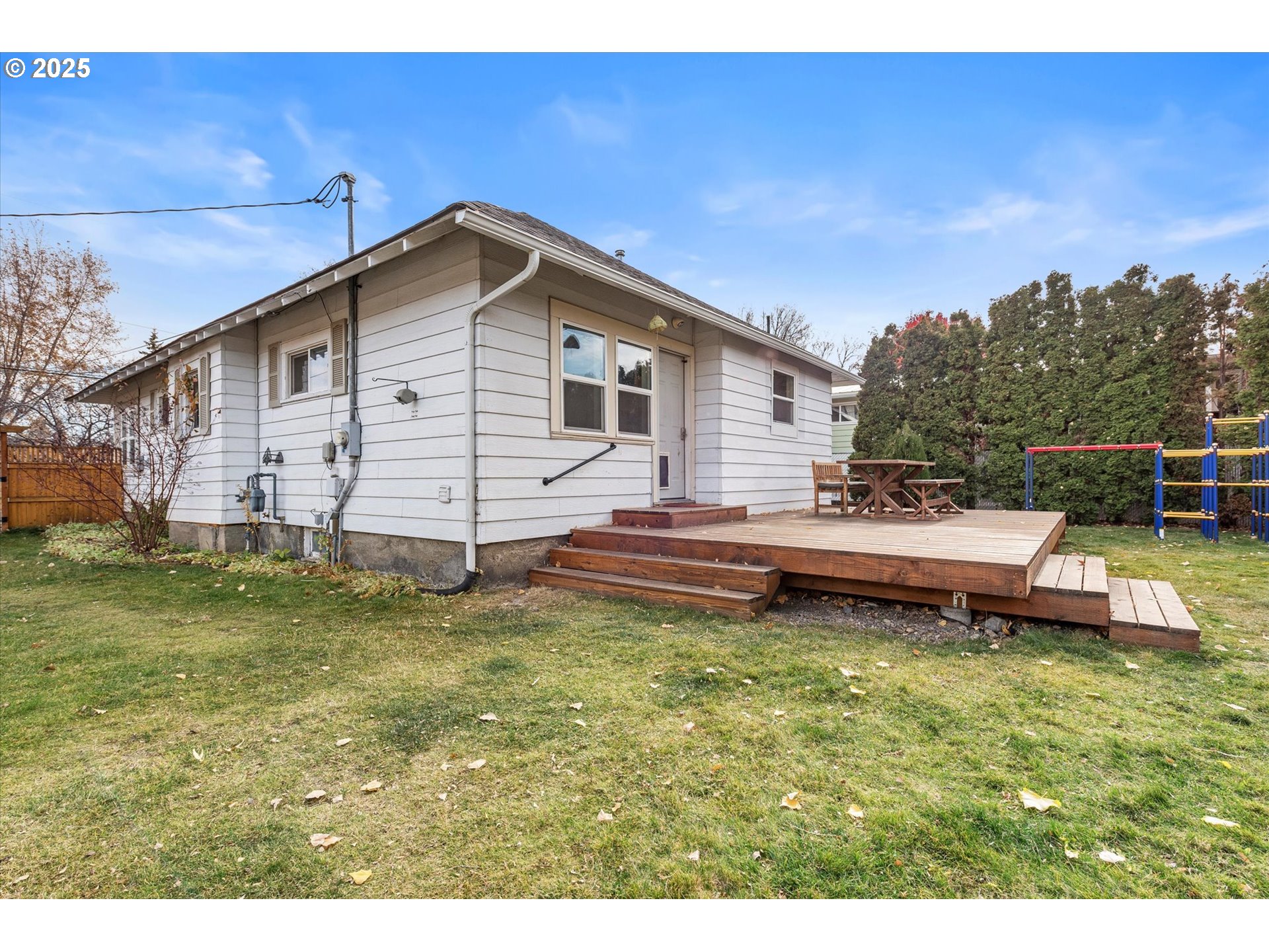 2819 College Street Baker City, OR 97814 - Photo 42 of 47 a view of a house with a yard and sitting area