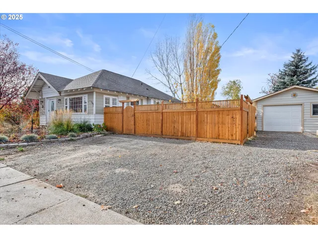 a house view with a backyard space
