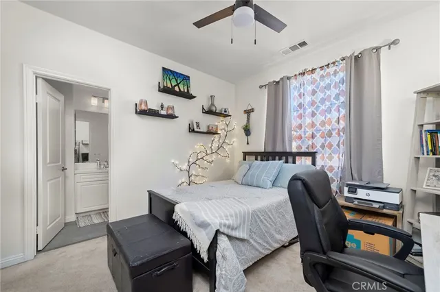 a bedroom with furniture and a window