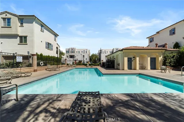 a view of a house with swimming pool