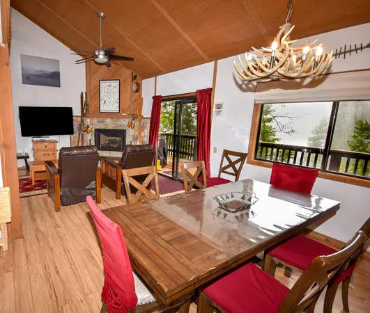 a view of a dining room with many windows