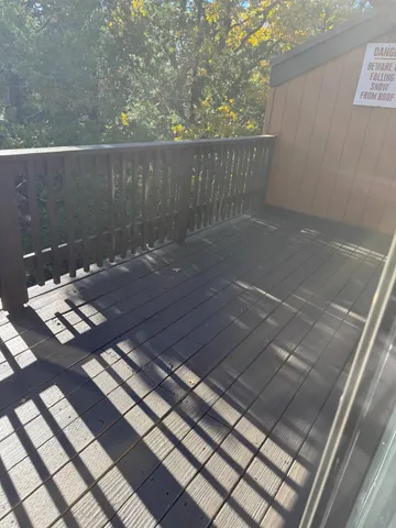 a view of backyard with barbeque oven