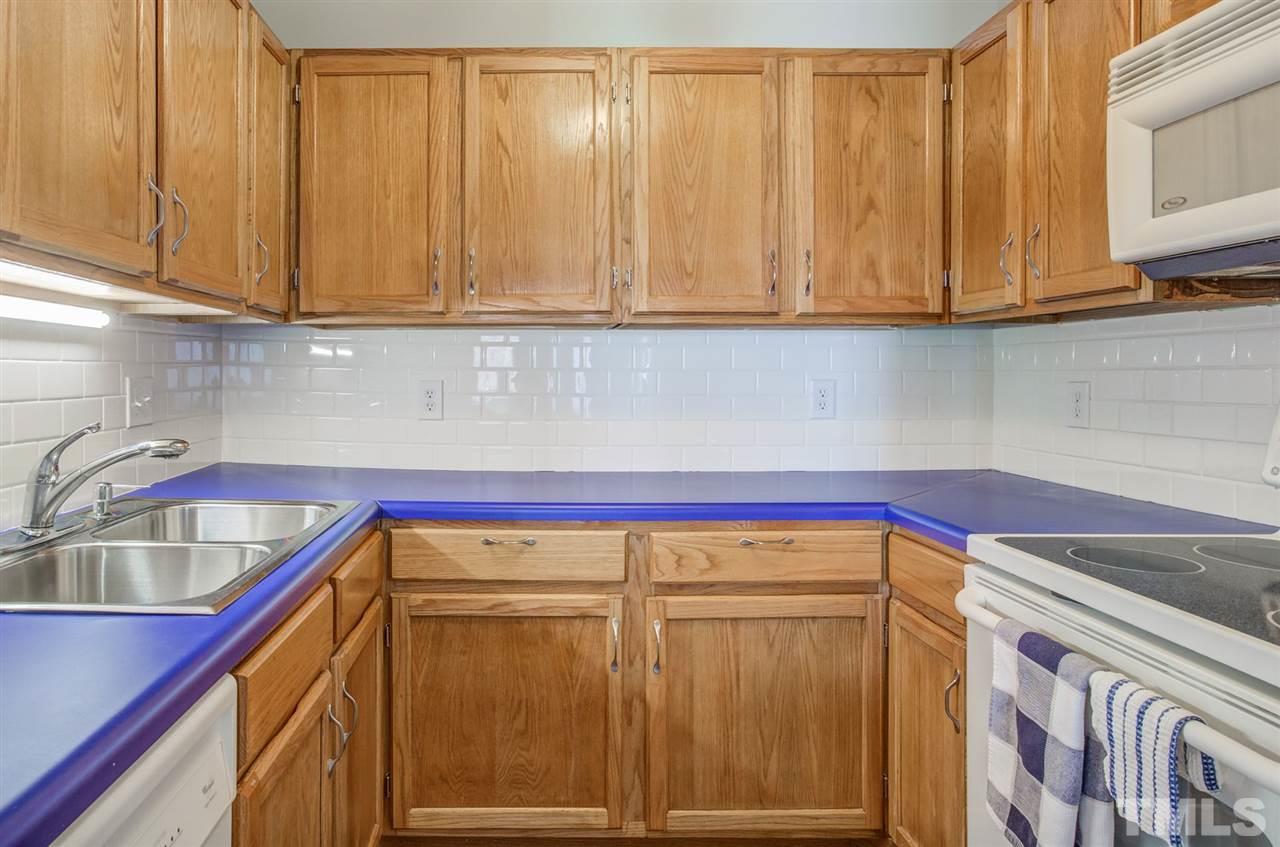 4641 Timbermill Court, Unit 201 Raleigh, NC 27612 - Photo 15 of 30 Great kitchen storage