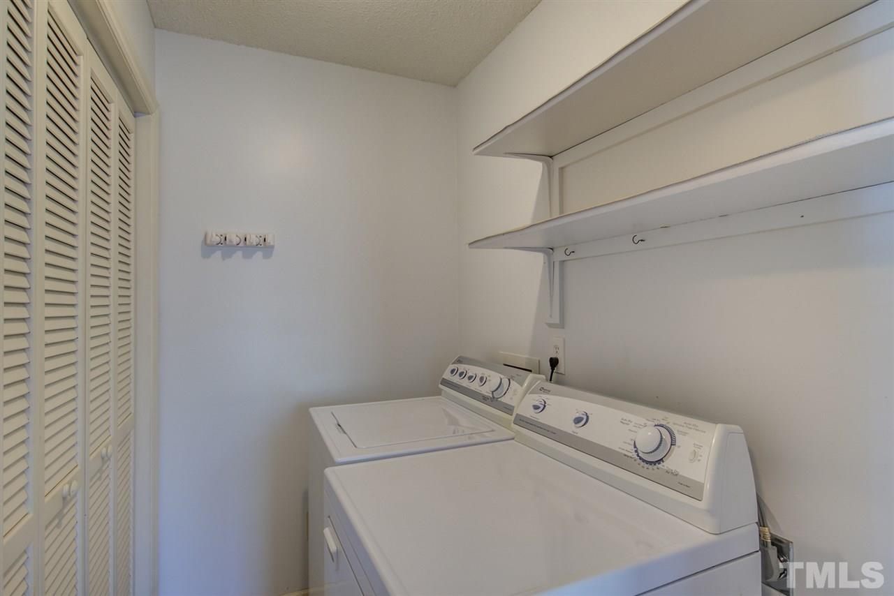 4641 Timbermill Court, Unit 201 Raleigh, NC 27612 - Photo 25 of 30 Functional laundry/utilities room.