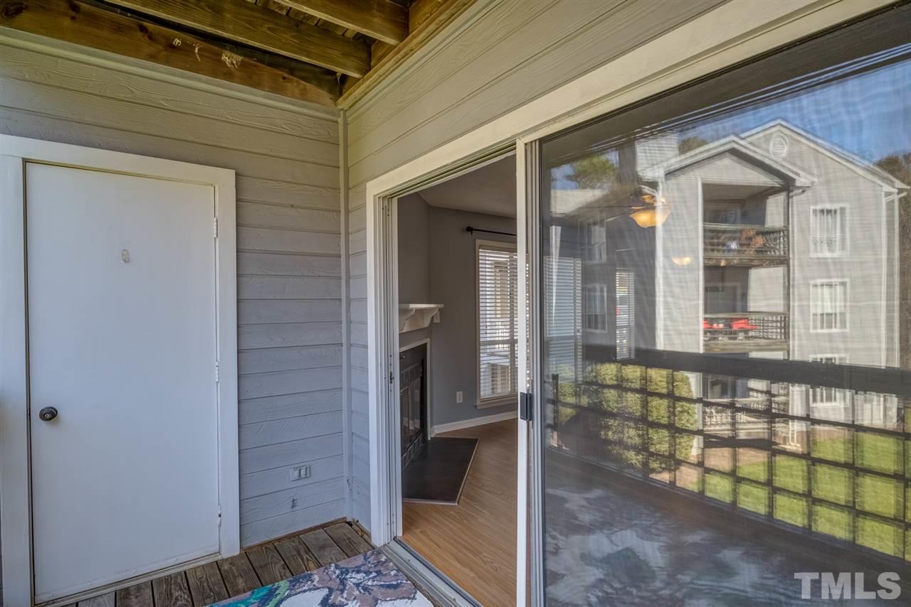 4641 Timbermill Court, Unit 201 Raleigh, NC 27612 - Photo 26 of 30 Covered deck off the living room with storage!