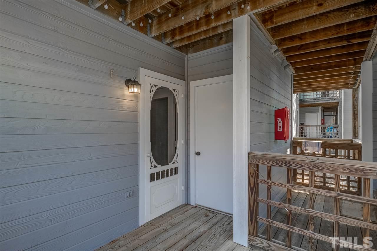 4641 Timbermill Court, Unit 201 Raleigh, NC 27612 - Photo 28 of 30 Covered deck off master w/storage