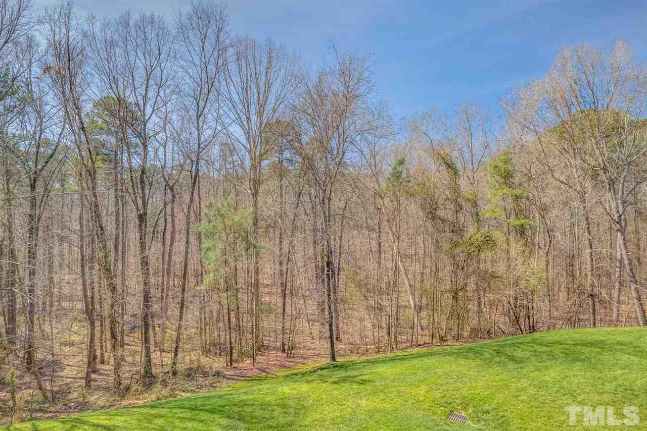 4641 Timbermill Court, Unit 201 Raleigh, NC 27612 - Photo 30 of 30 Wooded views from both covered decks!