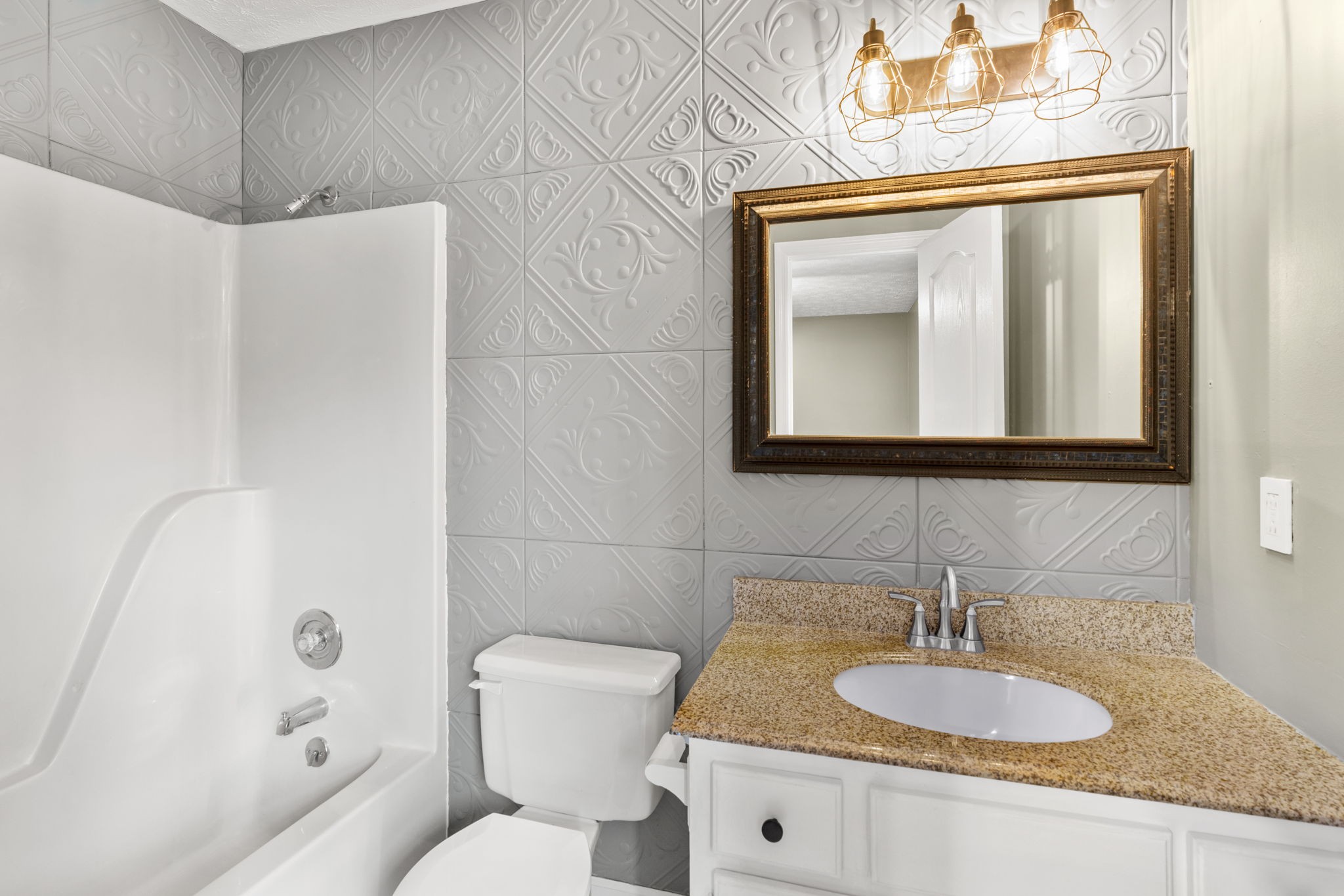 108 Meadows Road White House, TN 37188 - Photo 13 of 27 a bathroom with a granite countertop sink and a mirror