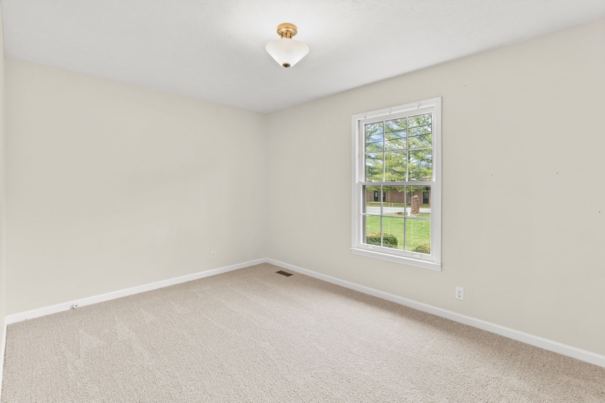 108 Meadows Road White House, TN 37188 - Photo 15 of 27 an empty room with a window