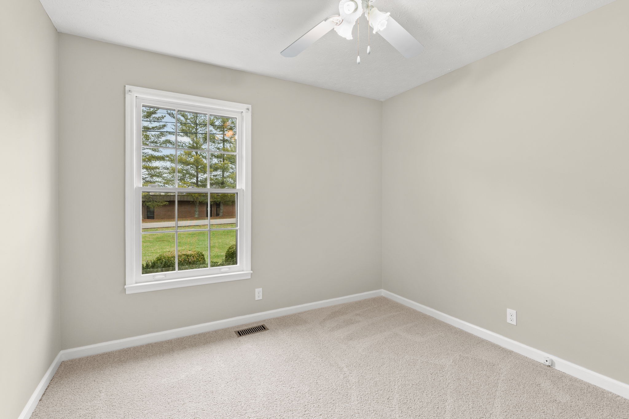 108 Meadows Road White House, TN 37188 - Photo 17 of 27 an empty room with a window