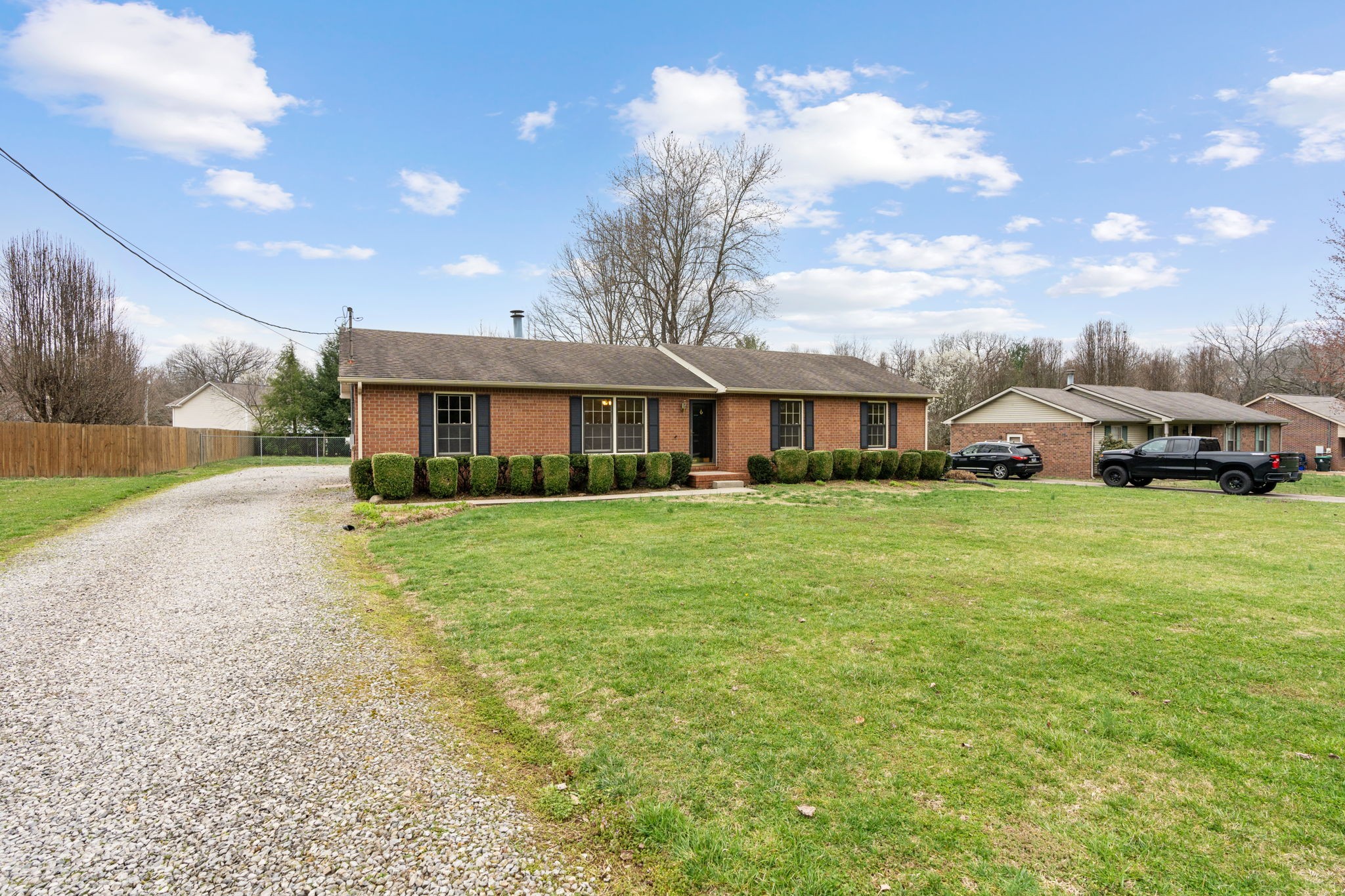 108 Meadows Road White House, TN 37188 - Photo 2 of 27 a front view of a house with a yard