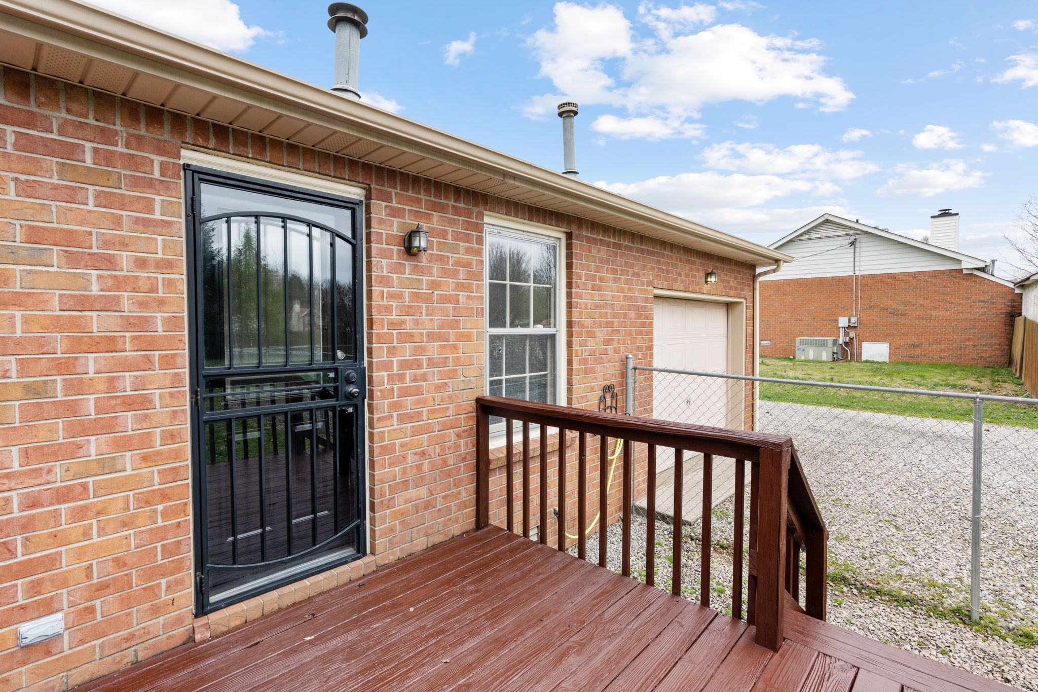 108 Meadows Road White House, TN 37188 - Photo 21 of 27 a view of a brick house with a large window