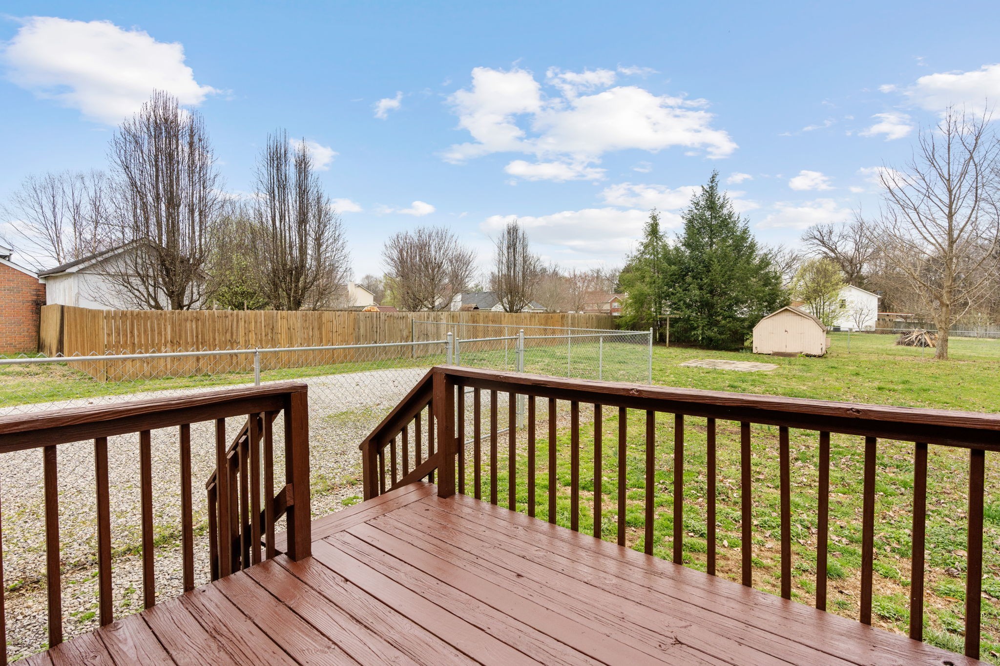 108 Meadows Road White House, TN 37188 - Photo 22 of 27 a view of wooden deck and a yard with swimming pool